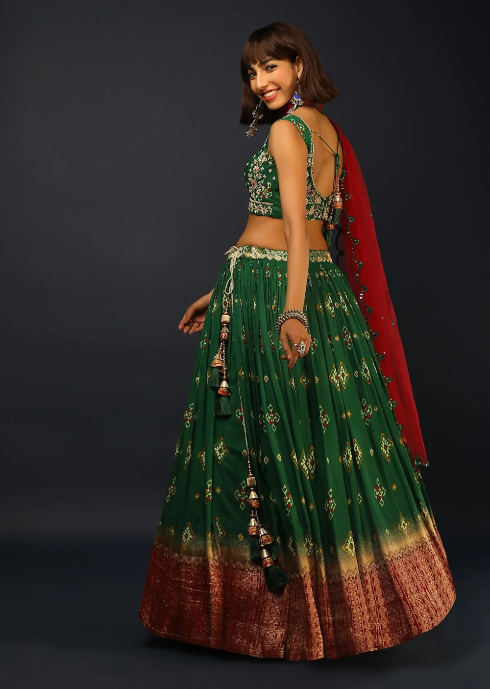 Bottle Green Lehenga In Silk With Patola Printed Buttis And Woven Maroon Border - Image 4