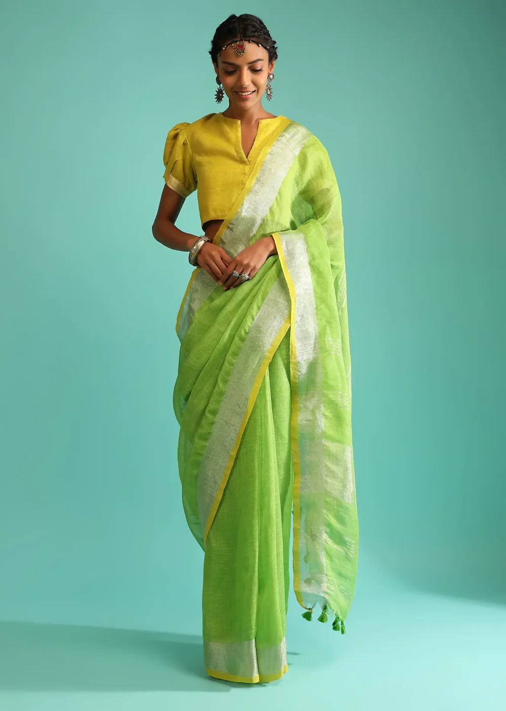 Parrot Green Saree In Linen With Silver Brocade Border And Striped Pallu Along With Yellow Unstitched Blouse