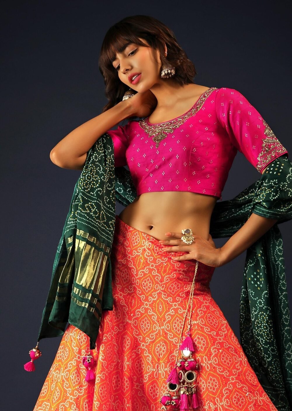 Tangerine Orange Lehenga In Bandhani Printed Silk With Rani Pink Choli And Green Bandhani Dupatta - Image 5